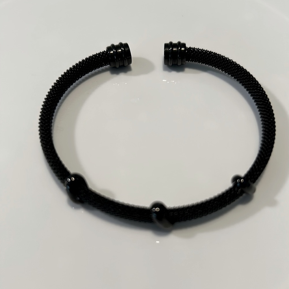 Black metal cuff bracelet from St. Maarten.
